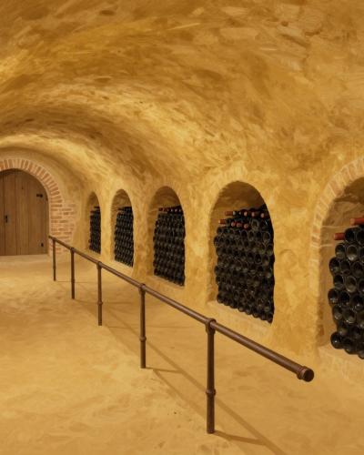 AI-generated illustration of Repnice Najger, a traditional wine cellar hand-dug into golden silica sand, with arched niches stacked with wine bottles