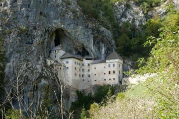 Free Discover the stunning Predjama Castle built into a cliffside cave in Slovenia. Stock Photo