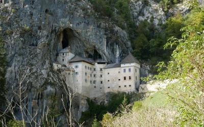 Free Discover the stunning Predjama Castle built into a cliffside cave in Slovenia. Stock Photo