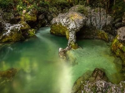 Free Discover the serene emerald pool in Slovenia's Mostnica Gorge. Tranquil and natural beauty. Stock Photo