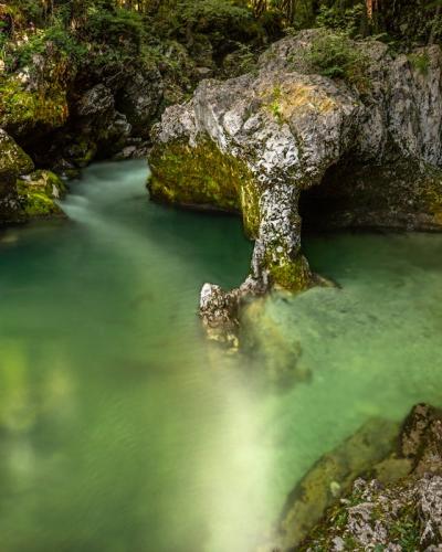 Free Discover the serene emerald pool in Slovenia's Mostnica Gorge. Tranquil and natural beauty. Stock Photo