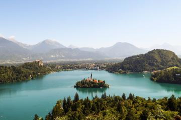 Scenic aerial view showcasing the beauty of Lake Bled and its iconic island in Slovenia. A natural paradise.
