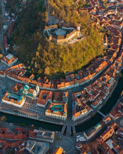 A breathtaking aerial view of Ljubljana showcasing its vibrant architecture and historic castle.