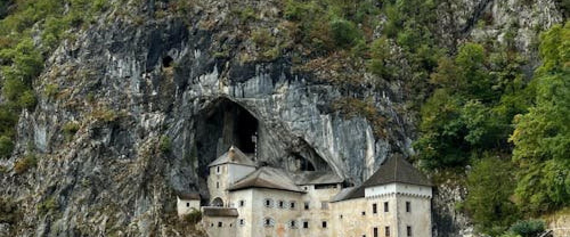 Free Explore the stunning Predjama Castle set in a cliff in Slovenia. Stock Photo
