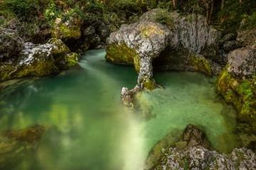 Free Discover the serene emerald pool in Slovenia's Mostnica Gorge. Tranquil and natural beauty. Stock Photo