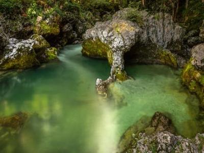 Free Discover the serene emerald pool in Slovenia's Mostnica Gorge. Tranquil and natural beauty. Stock Photo