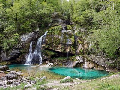 The Virje waterfall and its turquoise pool near Bovec