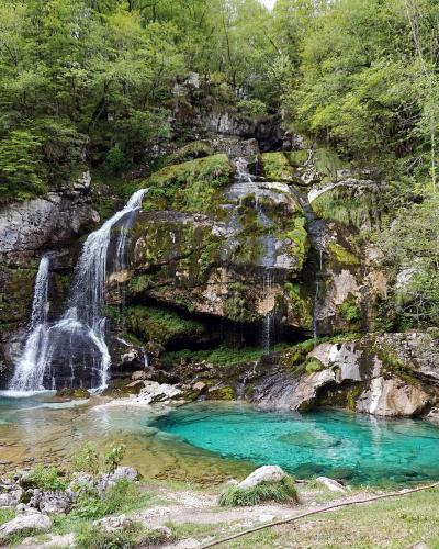 The Virje waterfall and its turquoise pool near Bovec