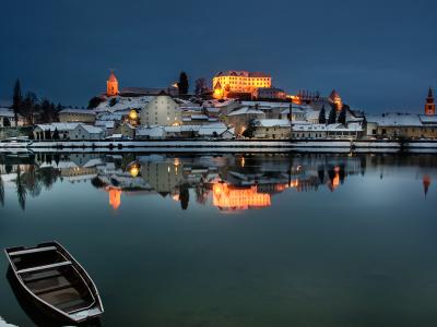 Ptuj and its hilltop castle reflected in the Drava River in the early morning, Štajerska