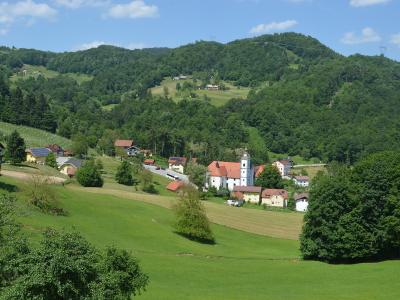 Green hills and village of Olimje, home of Jelenov greben