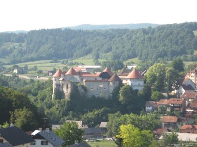 Žužemberk castle above the town in the Krka valley