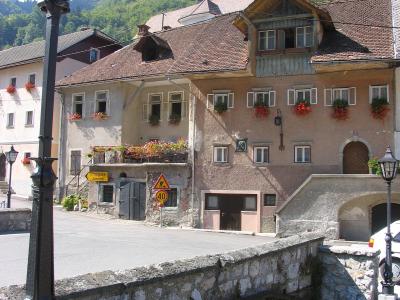 Kropa's old ironmasters' houses by the stream bridge