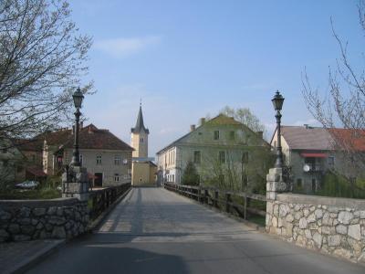 The bridge and church tower of the island town of Kostanjevica na Krki