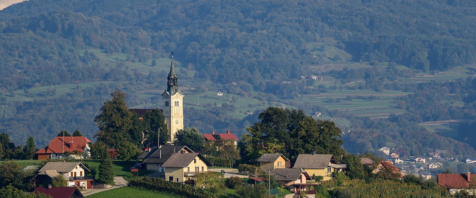 Trška gora hill with its church and vineyards above Novo mesto