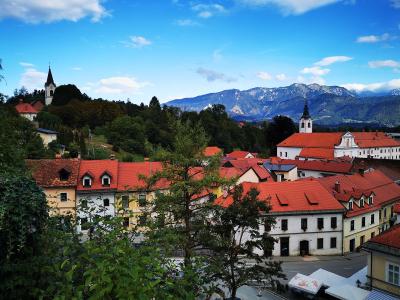 The red roofs of Kamnik old town beneath the Kamnik-Savinja Alps